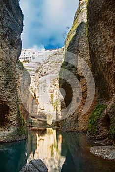 A view to Guadalevin river at El Tajo Gorge Canyon from the bottom of the secret water mine in Ronda, one of the most famous whit