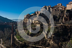 View to hanging houses `casas colgadas` of medieval city Cuenca old town and San Pablo bridge. Cuenca photo