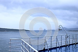 A view to the harbor of Olbia from the sea on a cloudy day, Sardinia, Italy