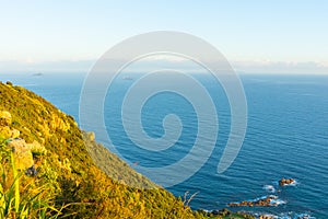 View to horizon from slope and summit of Mount Maunganui