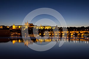 View To Hradschin Castle, St. Vitus Cathedral And Charles Bridge In Prague By Night