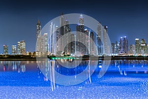 View to the illuminated skyline of the Dubai Marina at night