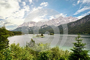 View to lake Eibsee and Zugspitze, Germany`s highest mountain in the bavarian alps, Bavaria Germany