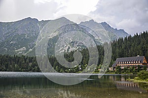 View to Lake Popradske pleso 1494m with mountain hotel in High Tatras, Slovakia