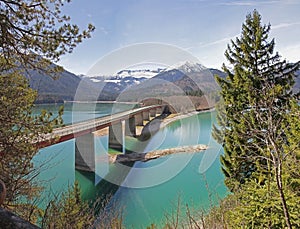 View to lake sylvenstein with bridge and karwendel mountains