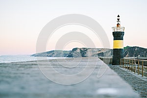 View to the lighthouse, crag and ocean