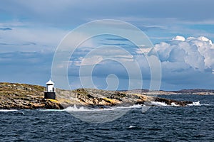 View to a lighthouse on the island Orust in Sweden