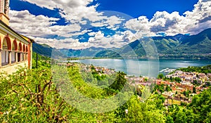 View to Locarno city, lake Maggiore and Swiss Alps in Ticino from Madonna del Sasso Church, Switzerland.