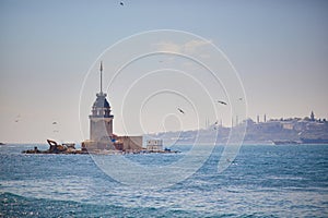 view to Maiden\'s tower in Uskudar distric on Asian side of the city across the Bosphorus strait in Istanbul, Turkey