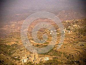 View to Manakha fortress and old city and terrace farming, Yemen