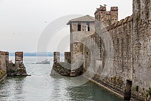 View to the medieval Rocca Scaligera castle in Sirmione town on Garda lake