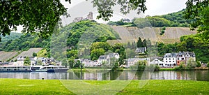 View to moselle river with passenger liner, ruin landshut and be