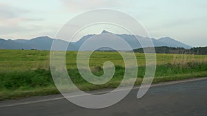 View to mount Krivan Slovak symbol from asphalt road on autumn evening