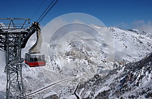 View to the mountains and red ski tram at Snowbird ski resoriew to the mountains and red ski tram at Snowbird ski resort in Utah