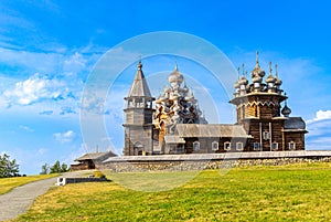 View to old monastery Kizhi Pogost, wooden Temple and Churchyard. Church of Transfiguration, bell tower in summer at