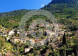 View To The Picturesque Village Of Deia In The Tramuntana Mountains On Balearic Island Mallorca