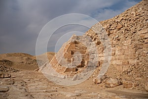 View to pyramid of Unas from archeological remain in the Saqqara necropolis, Egypt photo