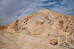 View to pyramid of Unas from archeological remain in the Saqqara necropolis, Egypt photo