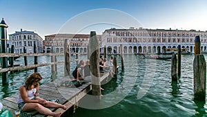 View to Rialto Market day to night timelapse after sunset, Venice, Italy viewed from pier across the Grand Canal