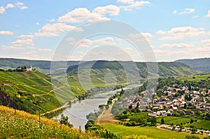 View to river Moselle and Marienburg Castle near village Puenderich - Mosel wine region in Germany