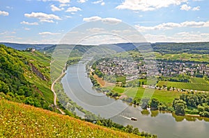 View to river Moselle and Marienburg Castle near village Puenderich - Mosel wine region in Germany