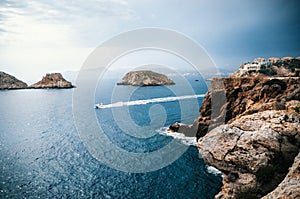 View to rocks of Santa Ponsa in Mallorca island before the storm photo