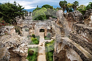 View to ruins in Hermano Pedro with garden, Antigua, Guatemala photo