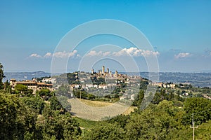 View to San Gimignano, old medieval typical Tuscan town with residential towers found therein