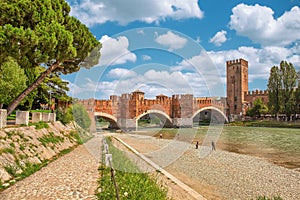 View to Scaliger Bridge, important historic landmark and popular tourist attraction in Verona, Italy