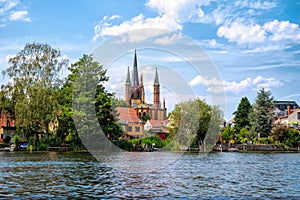 View to shore of Werder, Havel, with Holy Spirit Church -Heilig Geist Kirche-, Potsdam, Germany photo