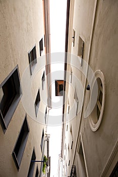 View to sky between historic house facades