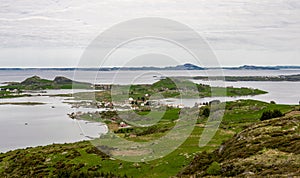 A view to a small village on Klosteroy island from top of Mastravarden hill on Mosteroy