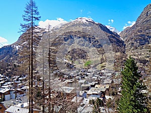 view to a small village in the swiss alps