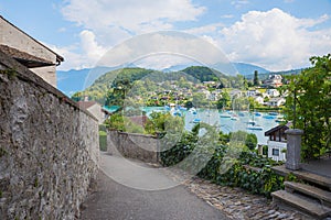 view to Spiez harbor and tourist resort, walkway around the castle