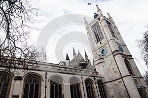 A view to St Margaret`s Church from Parliament Square Garden early in the morning in Westminster, London photo