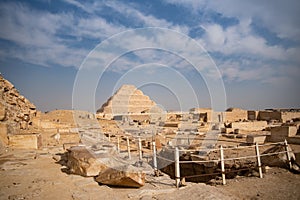 View to Step pyramid of Djoser in Saqqara from pyramid of Unas, an archeological remain in the Saqqara necropolis, Egypt photo