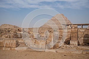 View to Step pyramid of Djoser in Saqqara from pyramid of Unas, an archeological remain in the Saqqara necropolis, Egypt photo