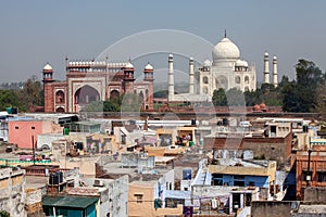 View to Taj Mahal and poor neighborhood buildings, Agra, India