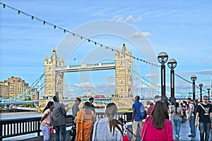 View to the Towerbridge in London with tourists in the foreground