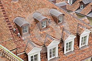 View to the traditional tiled roof with windows in Bern, Switzerland.