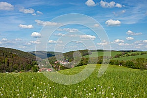 view to the village Mosbach and the surrounding Thuringian Forest photo