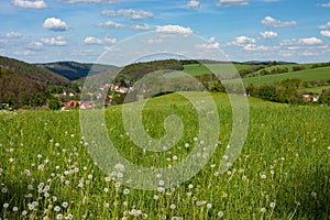 view to the village Mosbach and the surrounding Thuringian Forest photo