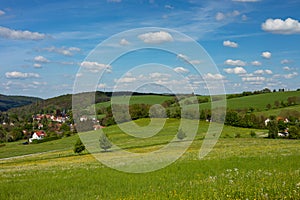 view to the village Mosbach and the surrounding Thuringian Forest photo