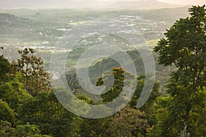 View to a village in a mountainous green area photo