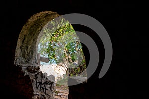 View to Village of Sant Feliu de Guixols at Costa Brava from tunnel in Catalonia,Mediterranean Sea,Spain