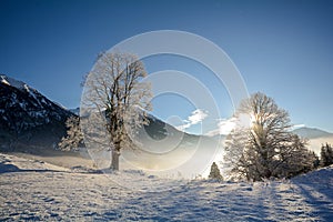 View to a winter landscape with mountain range, Gasteinertal valley near Bad Gastein, Pongau Alps