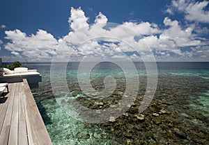 View to the wooden deck and ocean