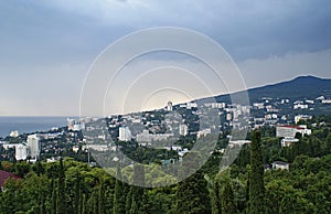 View to Yalta town on seacoast in cloudy day