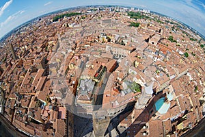 View from the top of Asinelli tower with a fish eye lens to Bologna, Italy.