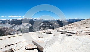 View from the top of the back side of Half Dome in Yosemite National Park in California USA